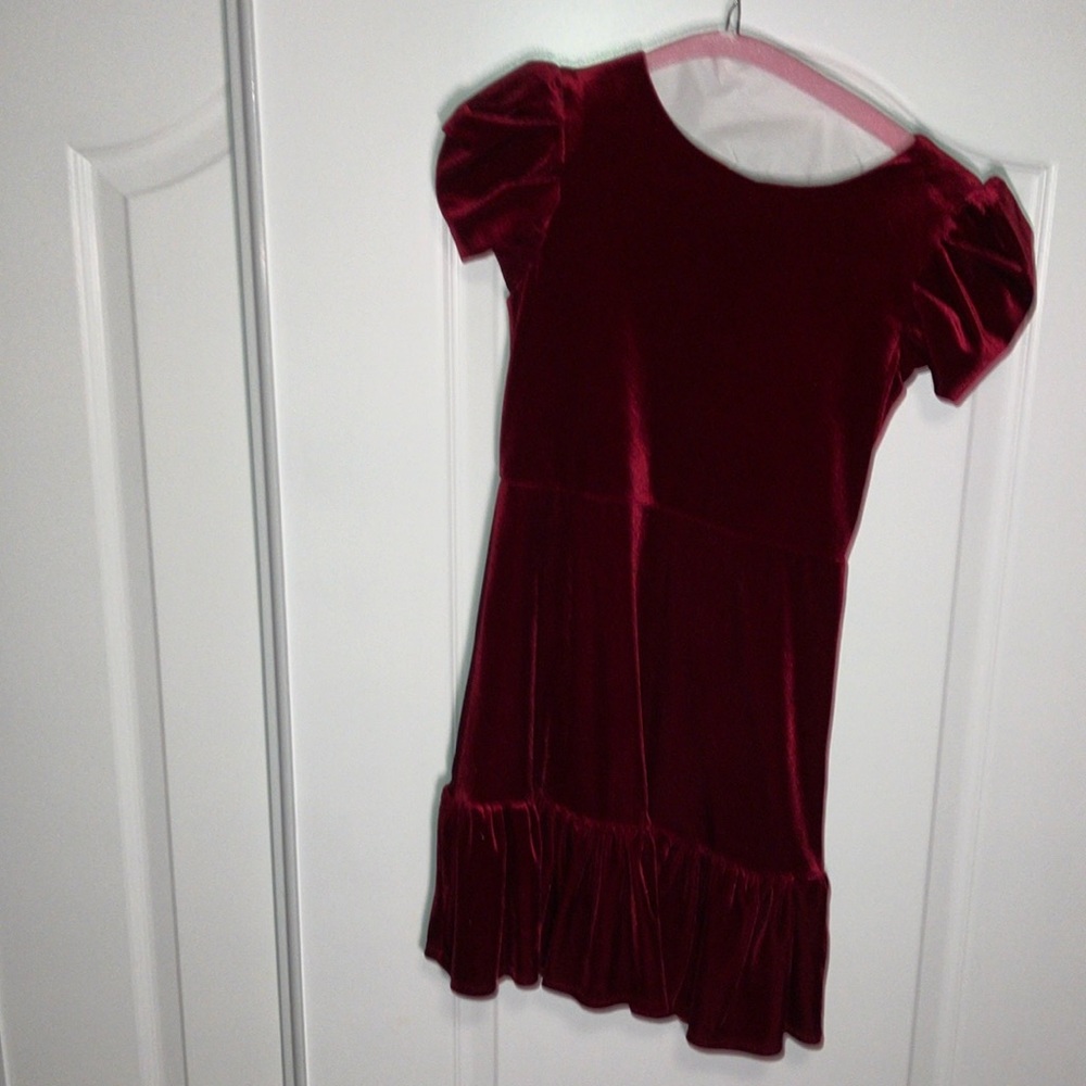 Chic Red Girls Dress with Black Trim and Pockets Perfect for Any Occasion!